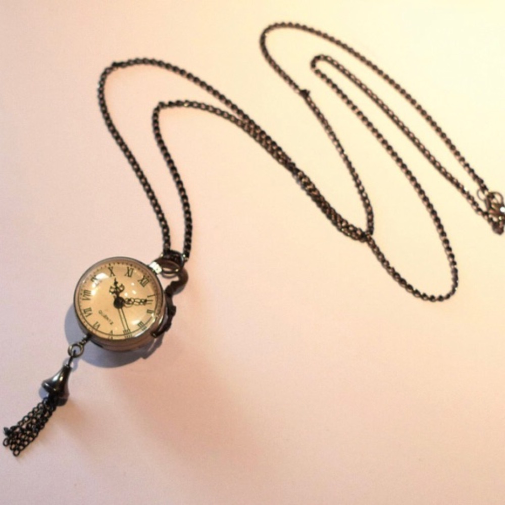Antiqued Bronze Clock with Tassel